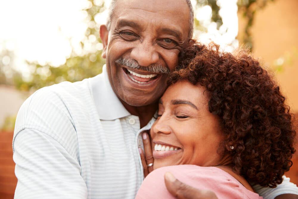 Mature happy couple in hug