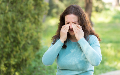 woman rubbing her dry eyes